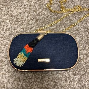 Cute denim clutch with removable cross body strap